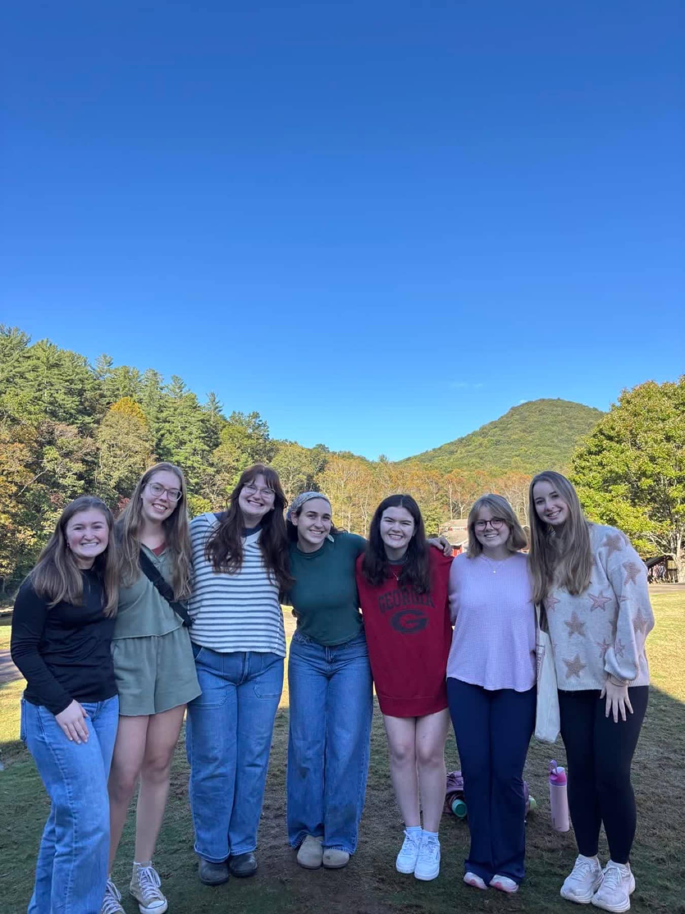 Students building friendships around a Community Group gathering