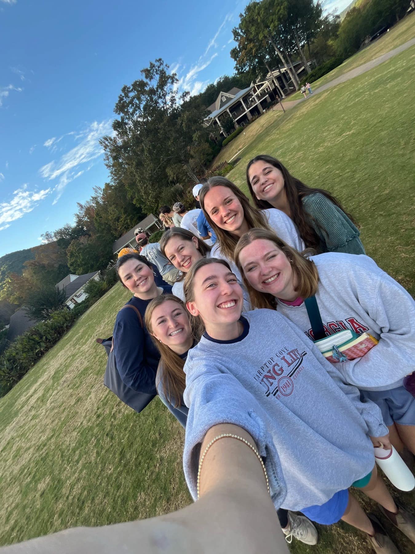 RUF students taking a group photo on the lawn at Fall Conference