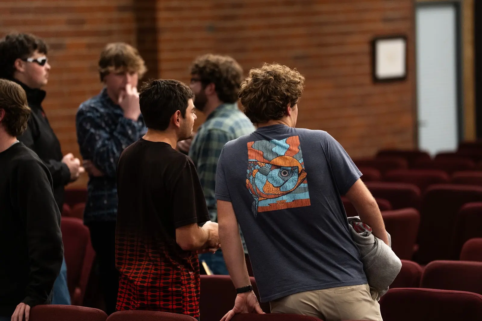 A group of students sharing conversation after Large Group