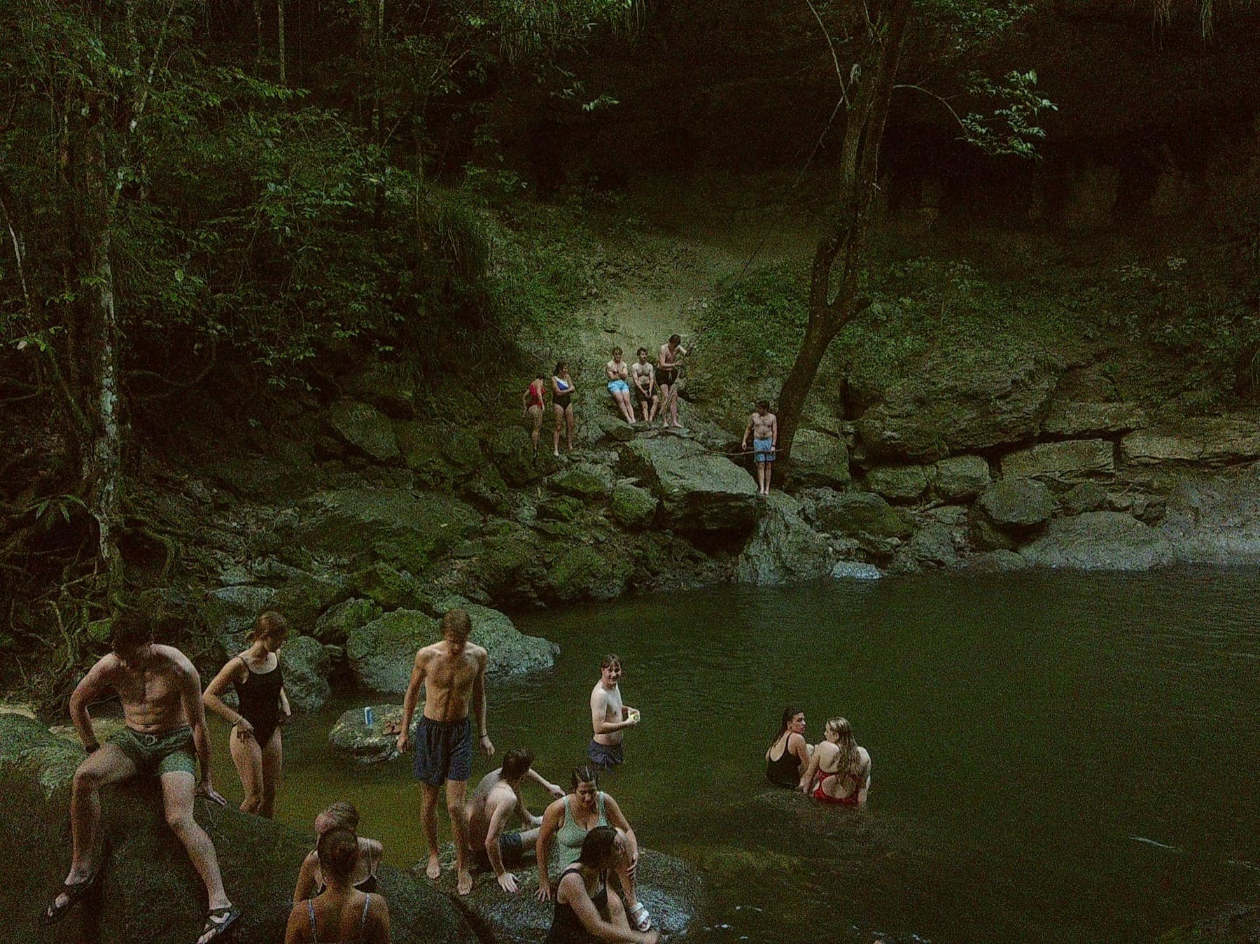 The Puerto Rico mission team gathered together at a waterfall