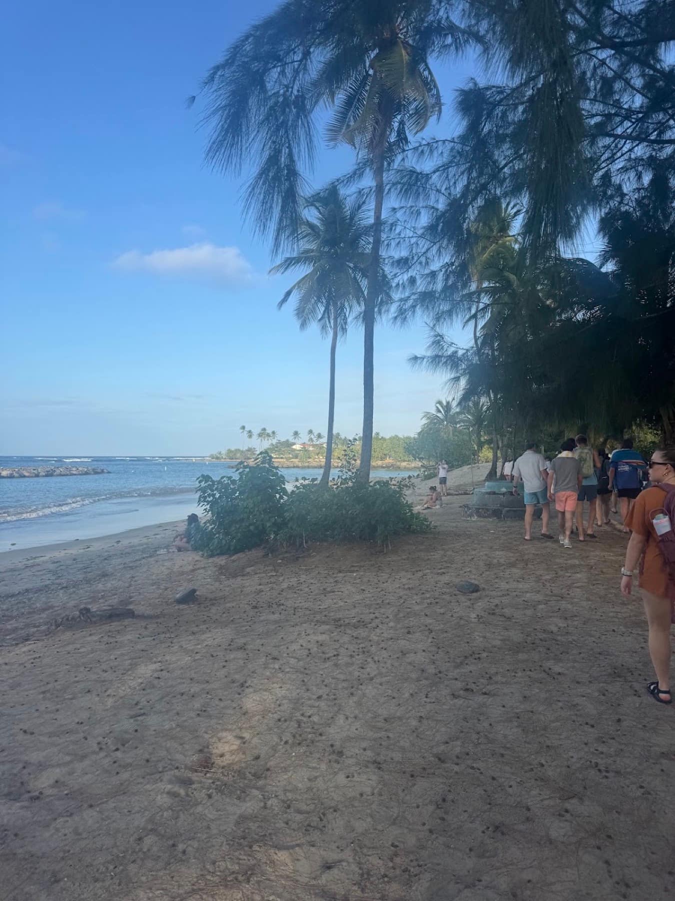 The mission team spending time together beside the ocean