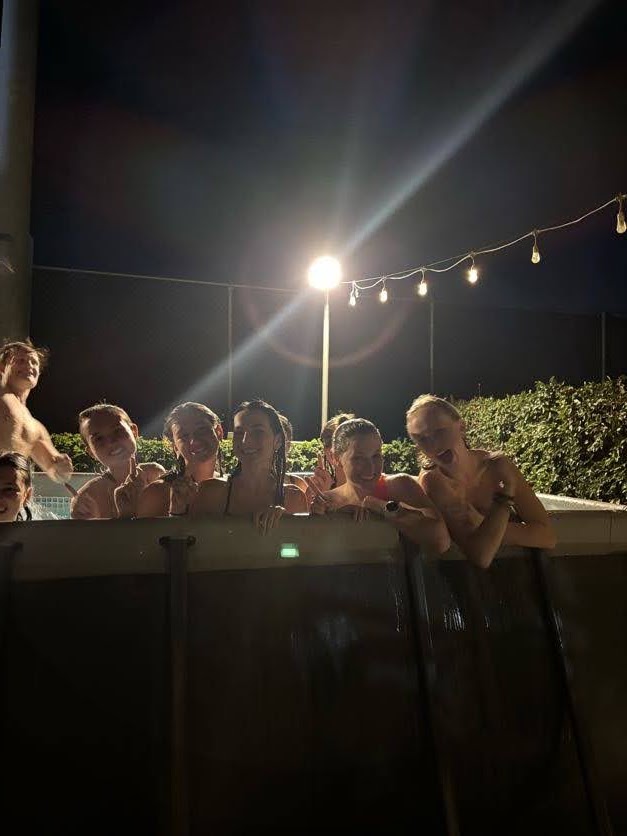 Friends taking a group selfie at the end of a full day