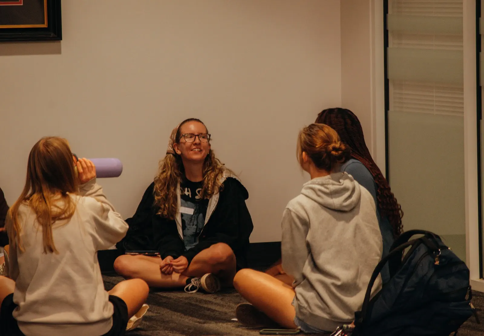 Freshmen sitting together for a small-group conversation