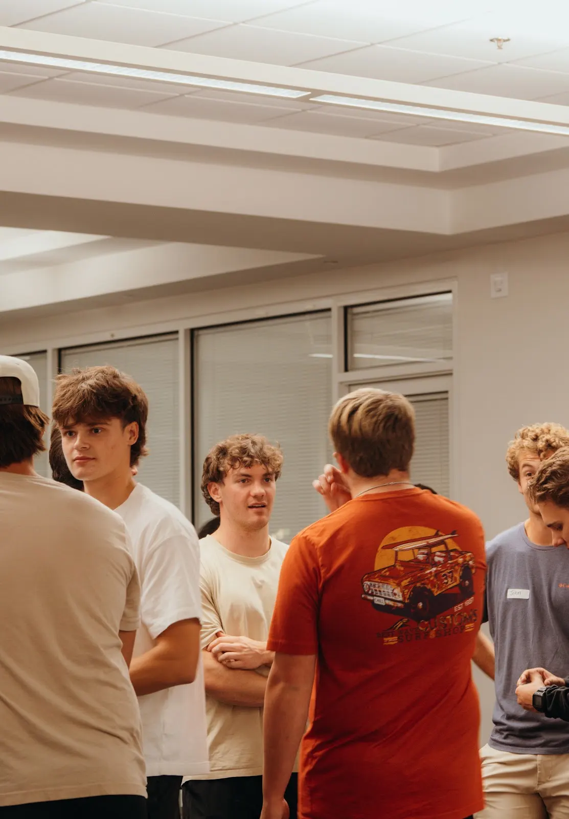 Freshmen meeting one another during the weekly gathering