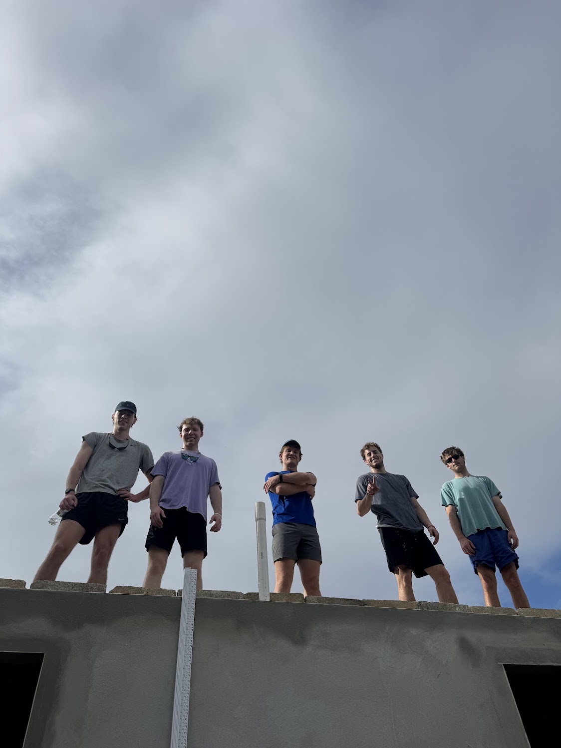 Friends posing together beneath the Puerto Rico sky