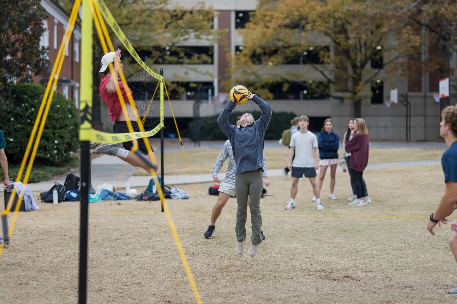 RUF at UGA students playing volleyball together on Myers Quad