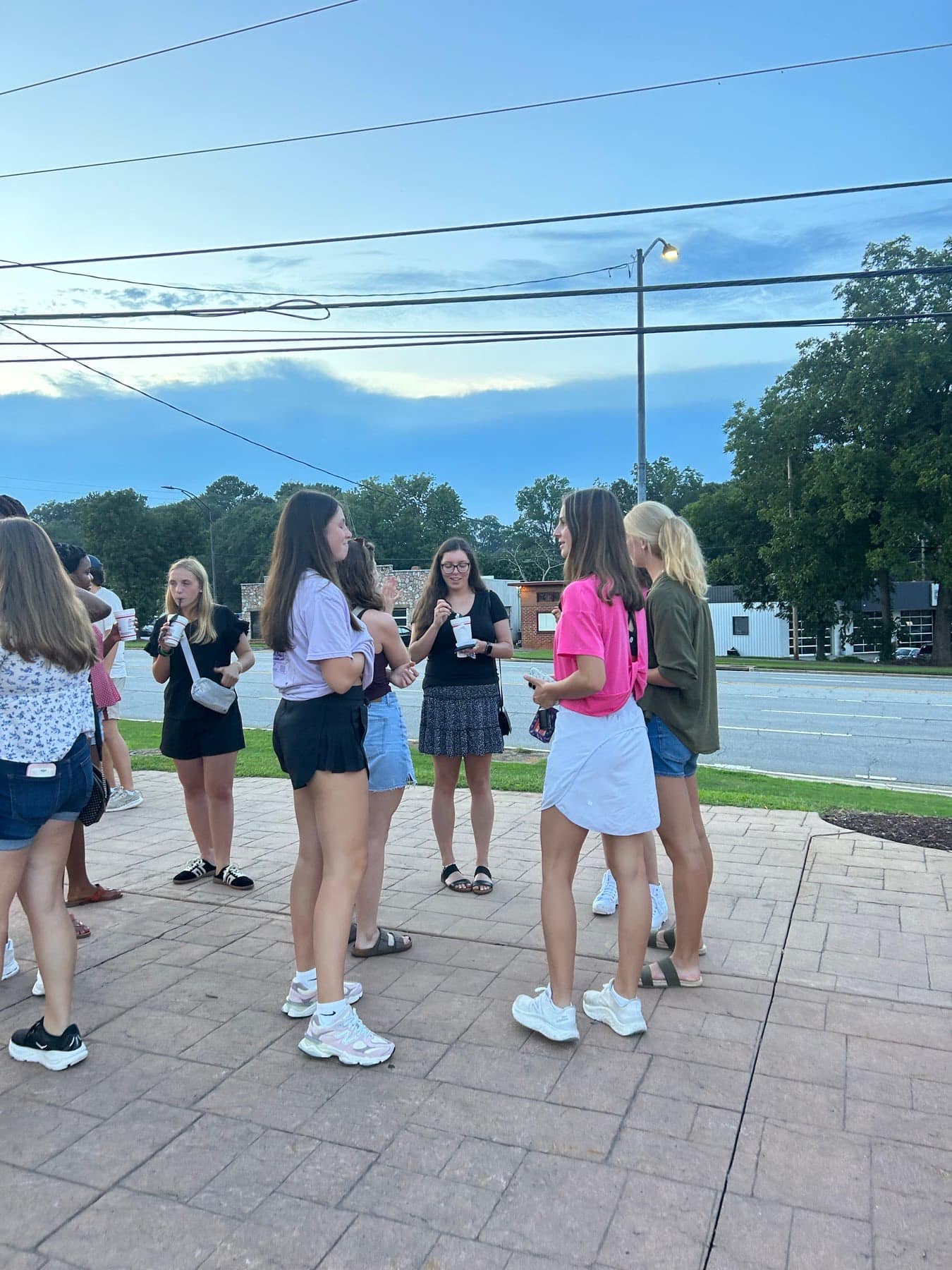 New friends talking outside during Taste of Athens