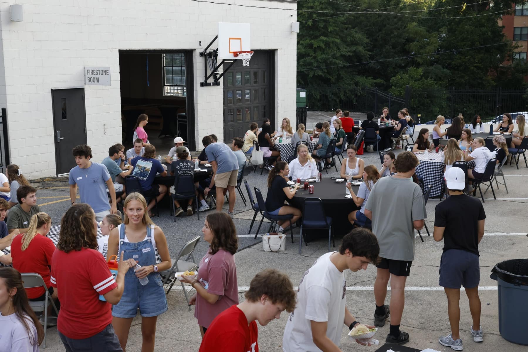 A large crowd of new RUF at UGA students gathering outside during Welcome Week