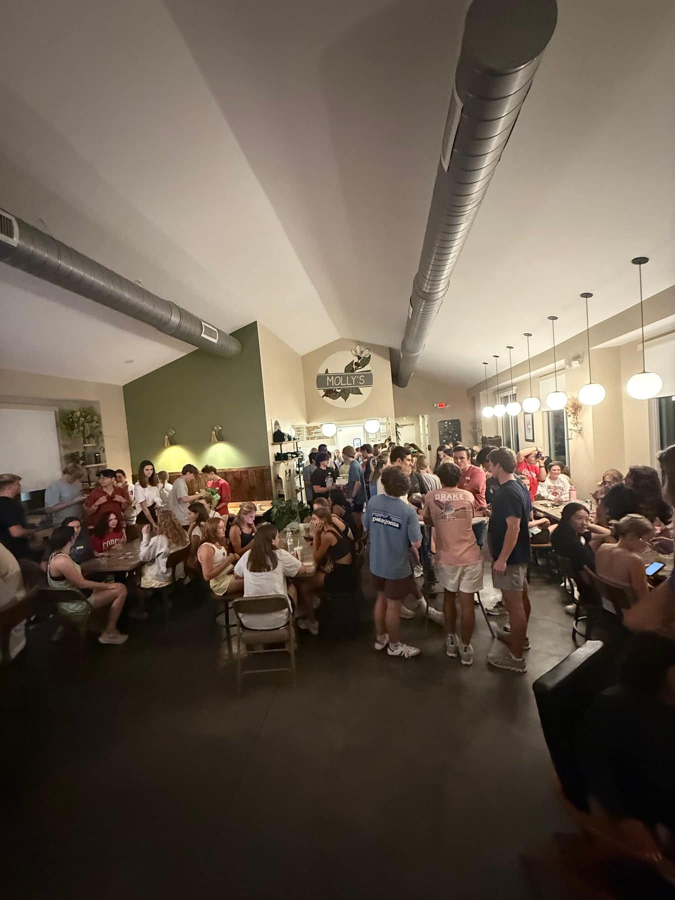 A packed room of students gathered for Welcome Week trivia at Molly’s