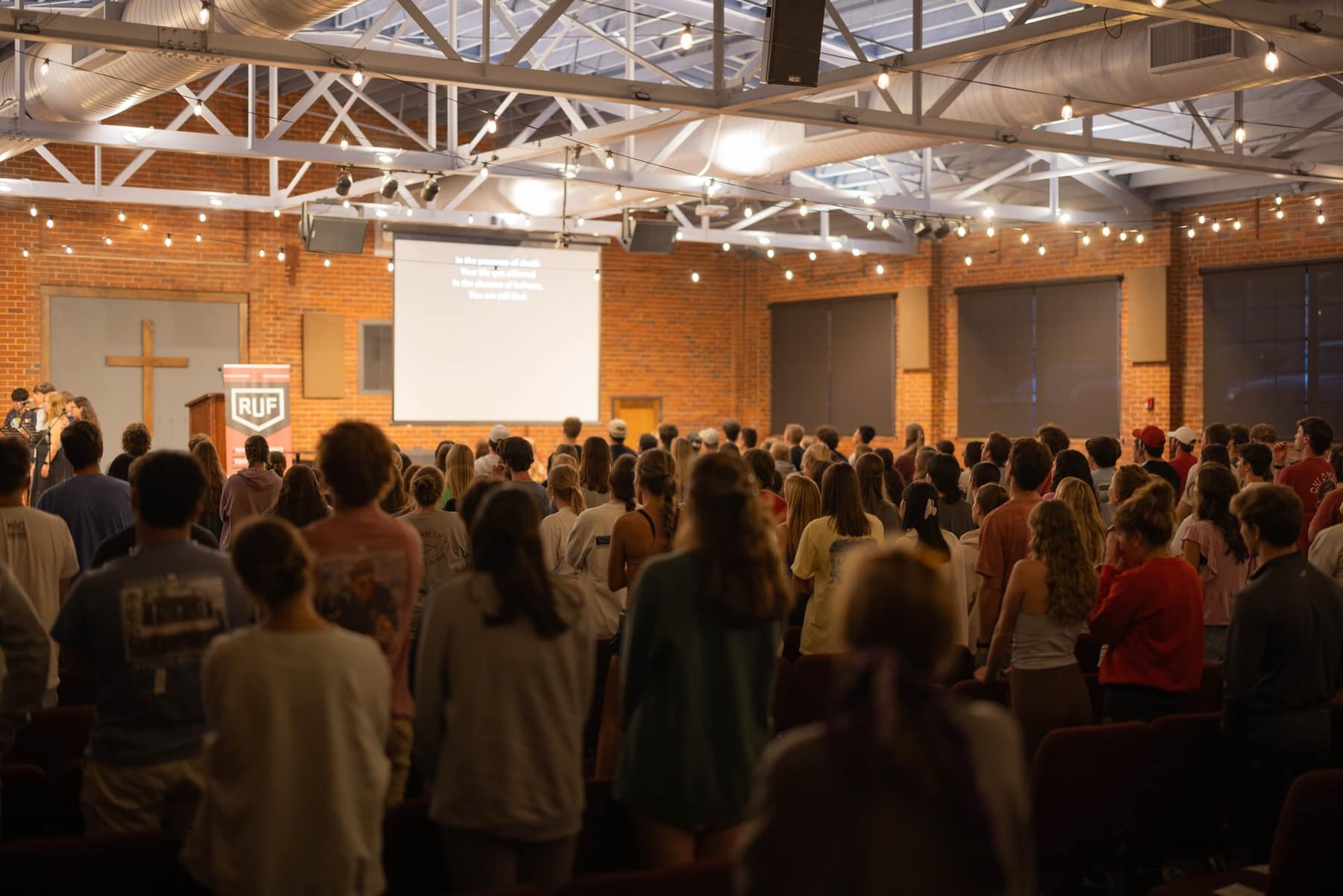 A full room of RUF at UGA students gathered for Large Group