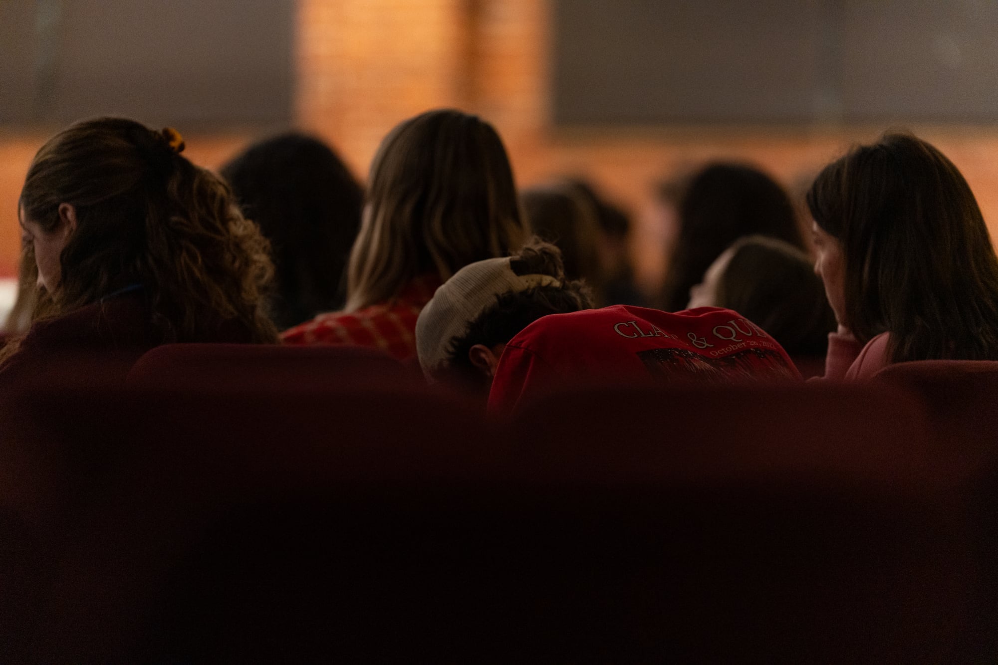 Students listening together during Large Group